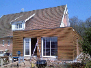 Extension d'habitation à Merville : ossature bois, isolant laine de bois.